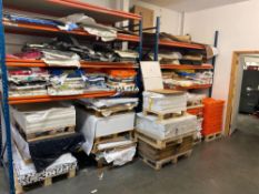 Contents of two racks to include a large quantity of used and unused paper stock as lotted