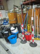 Quantity of assorted cleaning tools, to include brushes, spades, scrapers, buckets and two waste