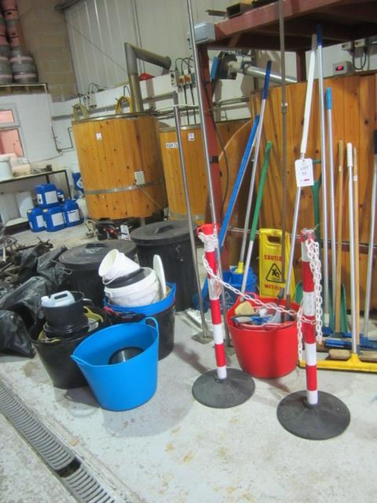 Quantity of assorted cleaning tools, to include brushes, spades, scrapers, buckets and two waste