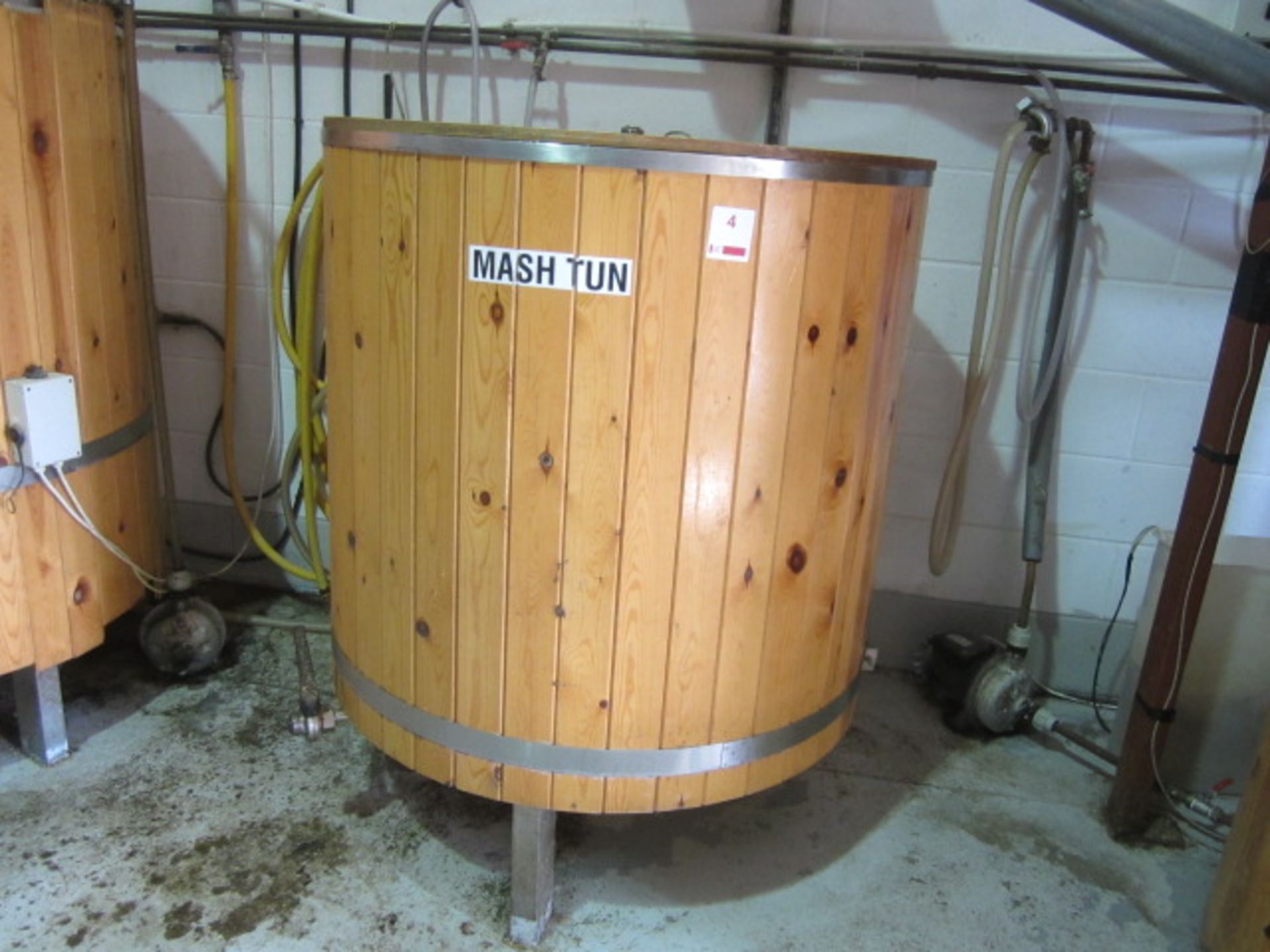 PBC Brewery Solutions stainless steel timber clad mash tun for 6 barrel brewing system on stand,