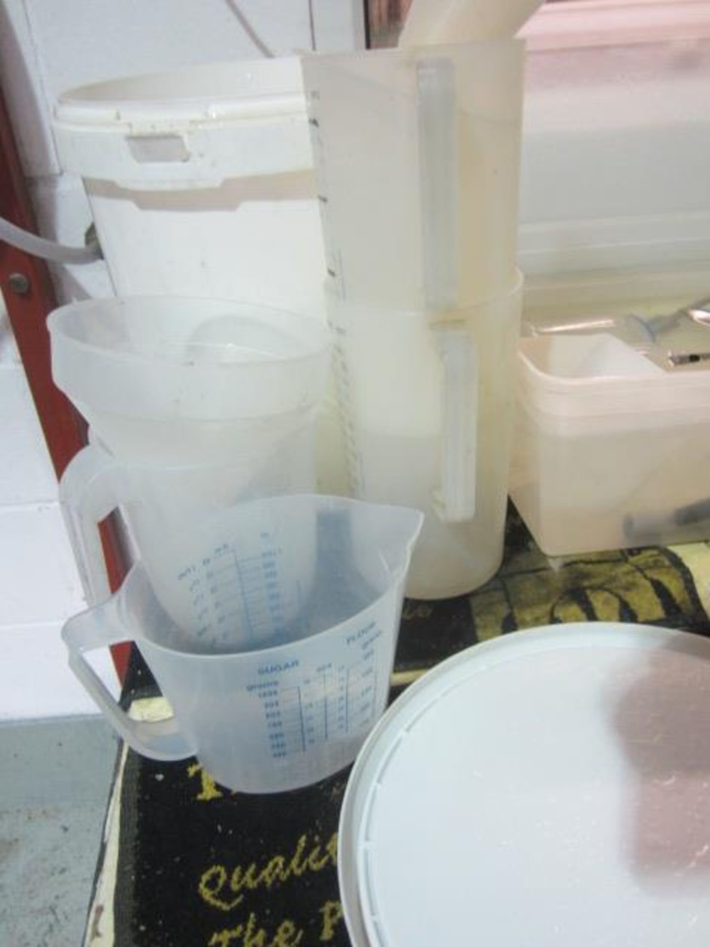 Quantity of assorted test equipment to include glass temperature gauges, plastic jugs, measuring - Image 7 of 7