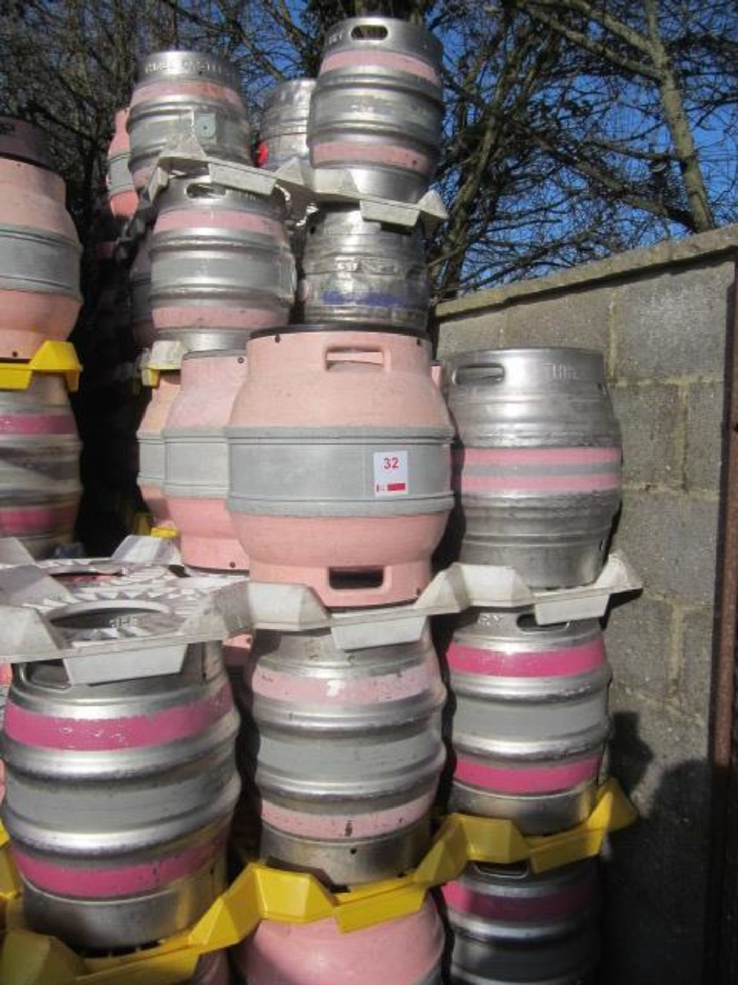 Seventy five 9 gallon mixed metal and plastic casks and ten plastic cask trays