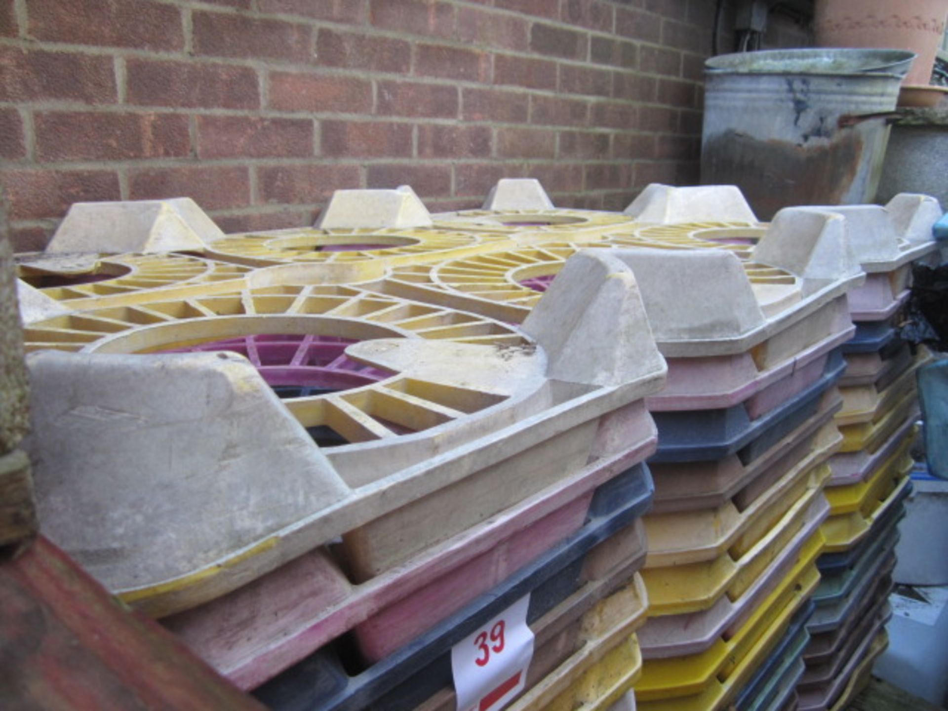 Sixteen plastic cask trays