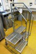 Two stainless steel twin tread steps (one mobile)
