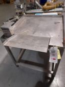 Stainless steel table Fully Stainless Steel frame table. Fixed on/off ramp plus platform for