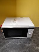 Indesit refrigerator and bench top microwave oven