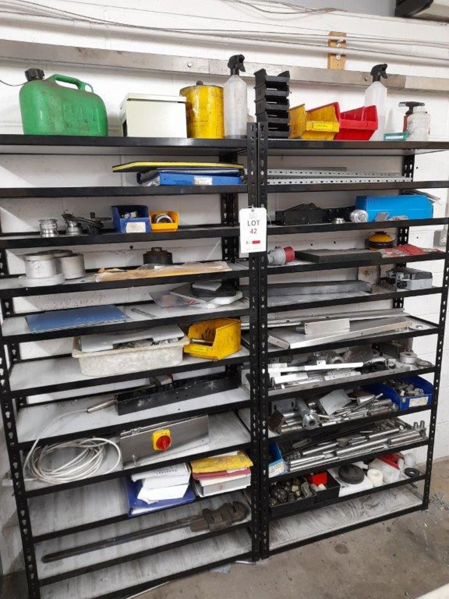 2 x bays of boltless steel shelving and contents including spare parts plus steel double door