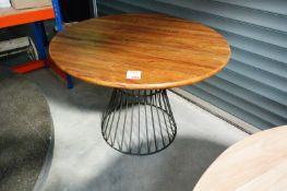 Metal legged wooden topped table, 110cm diameter, 76cm high (please note: this lot is located at Uni