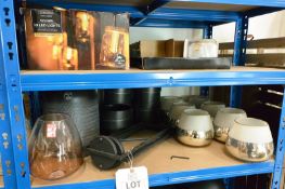 Contents of two shelves to include; LED lights, glass jars, clay pots and metal pots