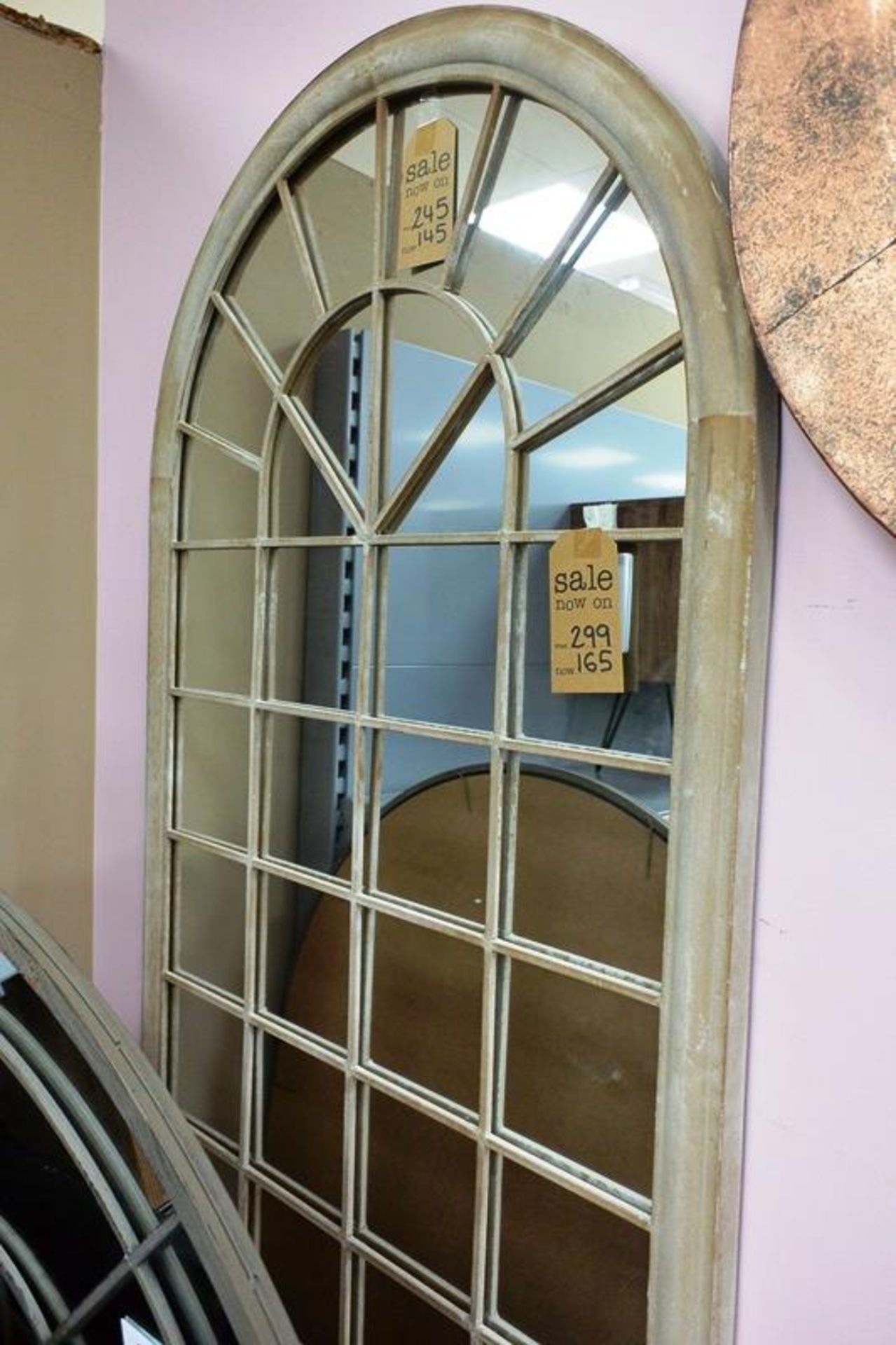Wall mountable arched top mirror