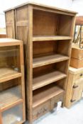 Two timber framed 3 shelf/2 drawer bookcases