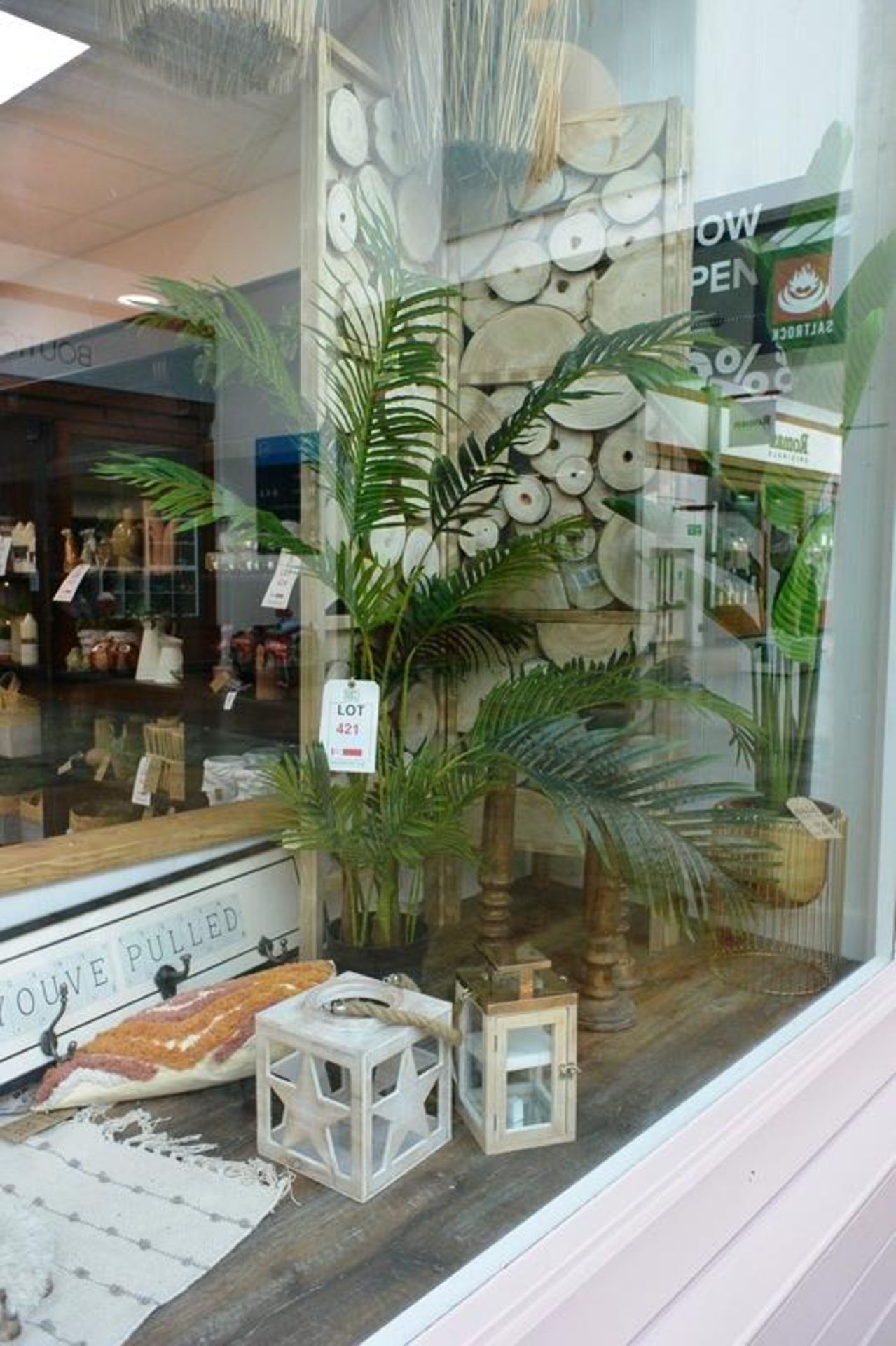 Loose contents of window display to include; timber room screen, faux house plants, candle lanterns,