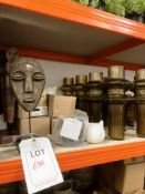 Contents of shelf to include glass vases, wooden statues and fox planters