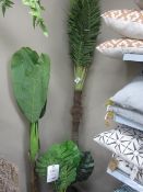 Three various size artificial plants