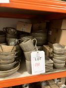 Quantity of brown ceramic plates, bowls, cups etc
