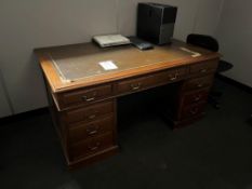 Wooden desk (contents not included)