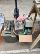 3 metal jerrycans 9 plastic fuel containers and a hoover vacuum cleaner