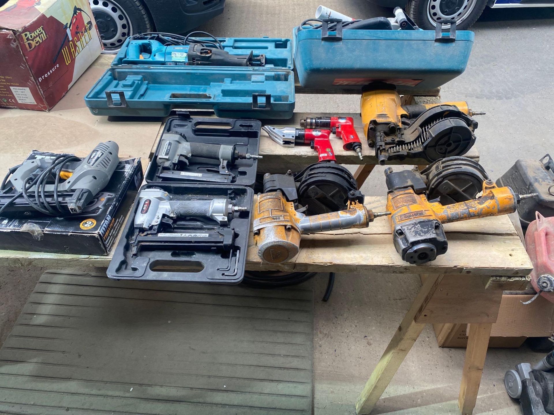 3 pneumatic nail guns 2 pneumatic tackers 1 pneumatic crimper one pneumatic drill and one 240 V