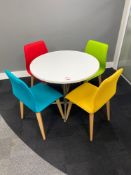 Round chrome framed meeting desk complete with 4 multicolored cloth, wooden framed chairs,