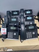 Six Yealink T42S IP telephones