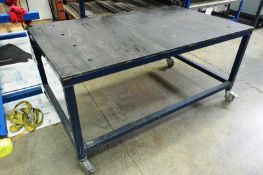 Mobile steel frame/steel topped table, approx 1700 x 1000mm