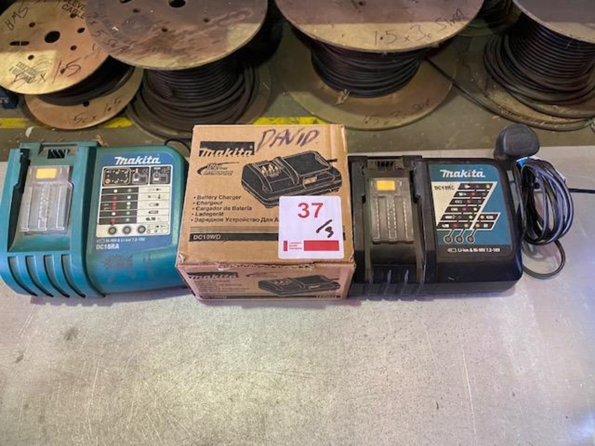 Three Makita 240v chargers models DC18RC DC18RA and DC10WD