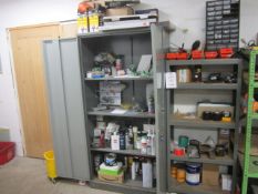 Rack and storage cupboard with contents including electrical tape, nuts, bolts, vehicle bulbs,