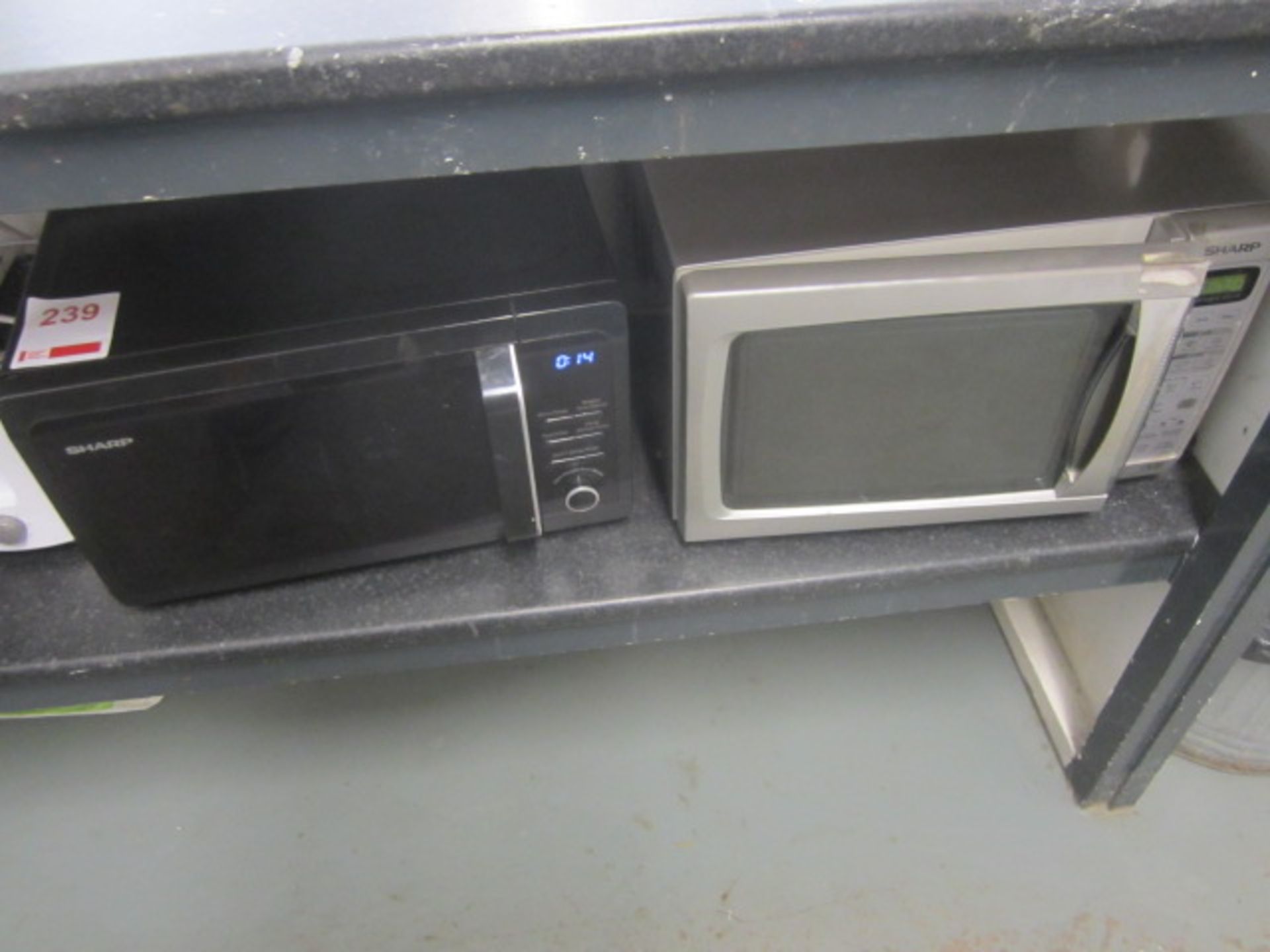 Two Sharp microwave ovens