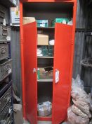Red timber twin door storage cabinet and contents to include latex gloves, respiratory mask, ever