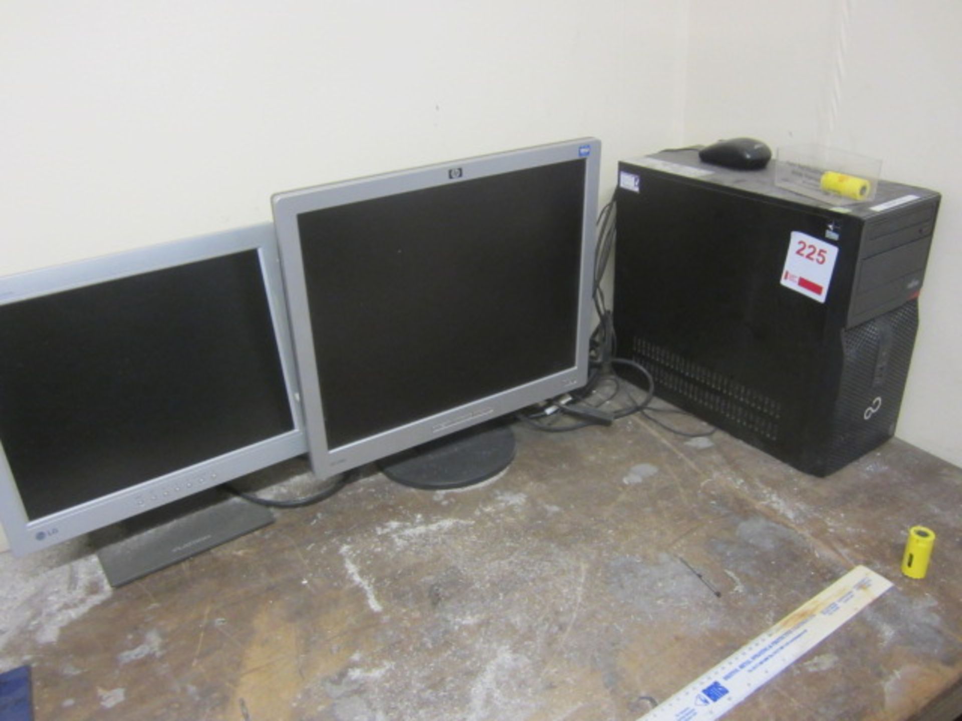 Fujitsu desktop PC and two flat screen monitors