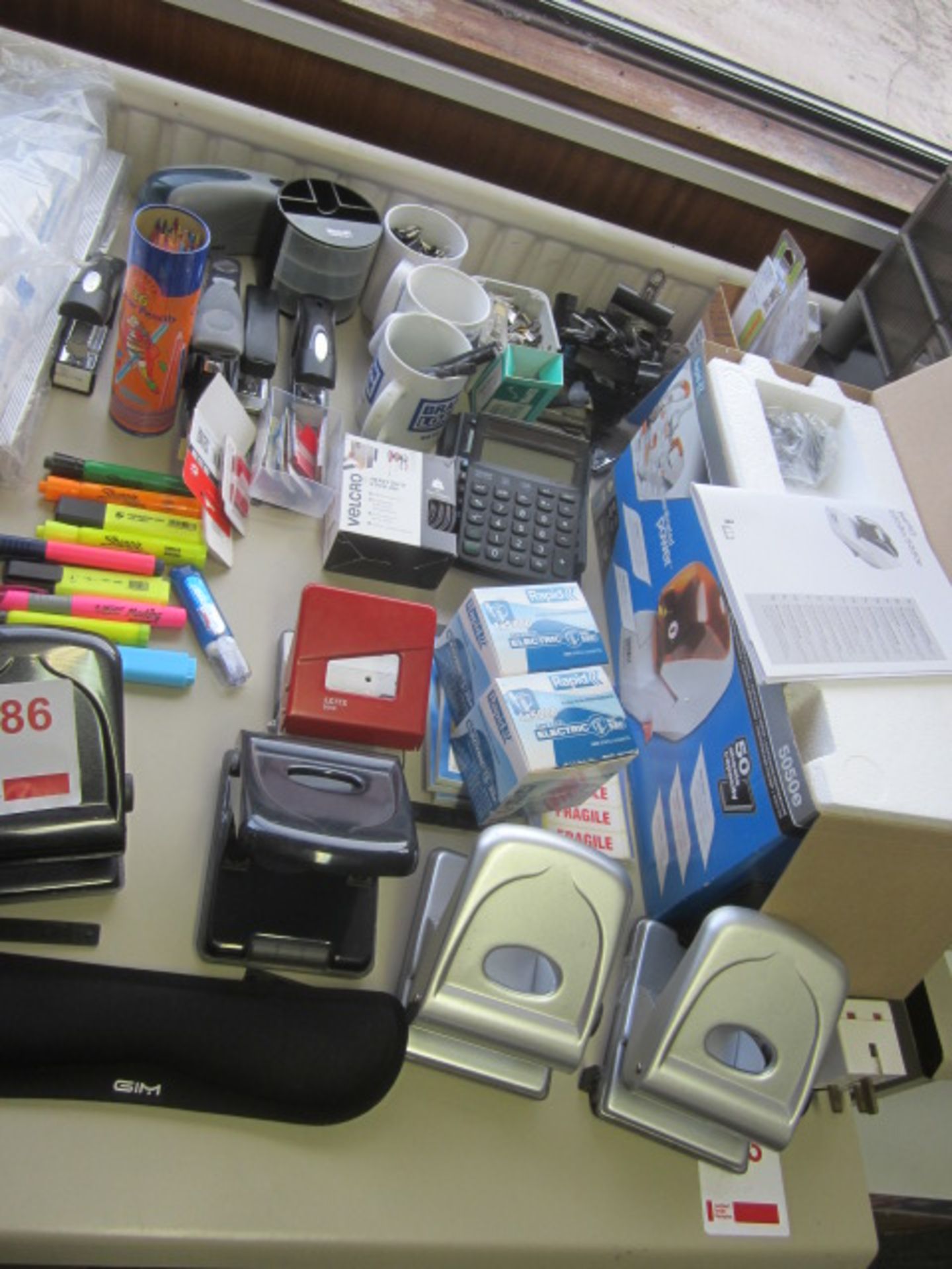 Quantity of assorted office sundries including rulers, electric stapler, calculators, hole - Image 5 of 10