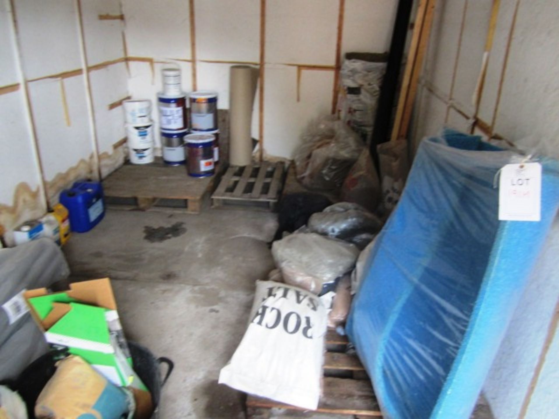 Contents of store room including floor paint, rock salt, pipe insulation, bagged glass grit, etc.