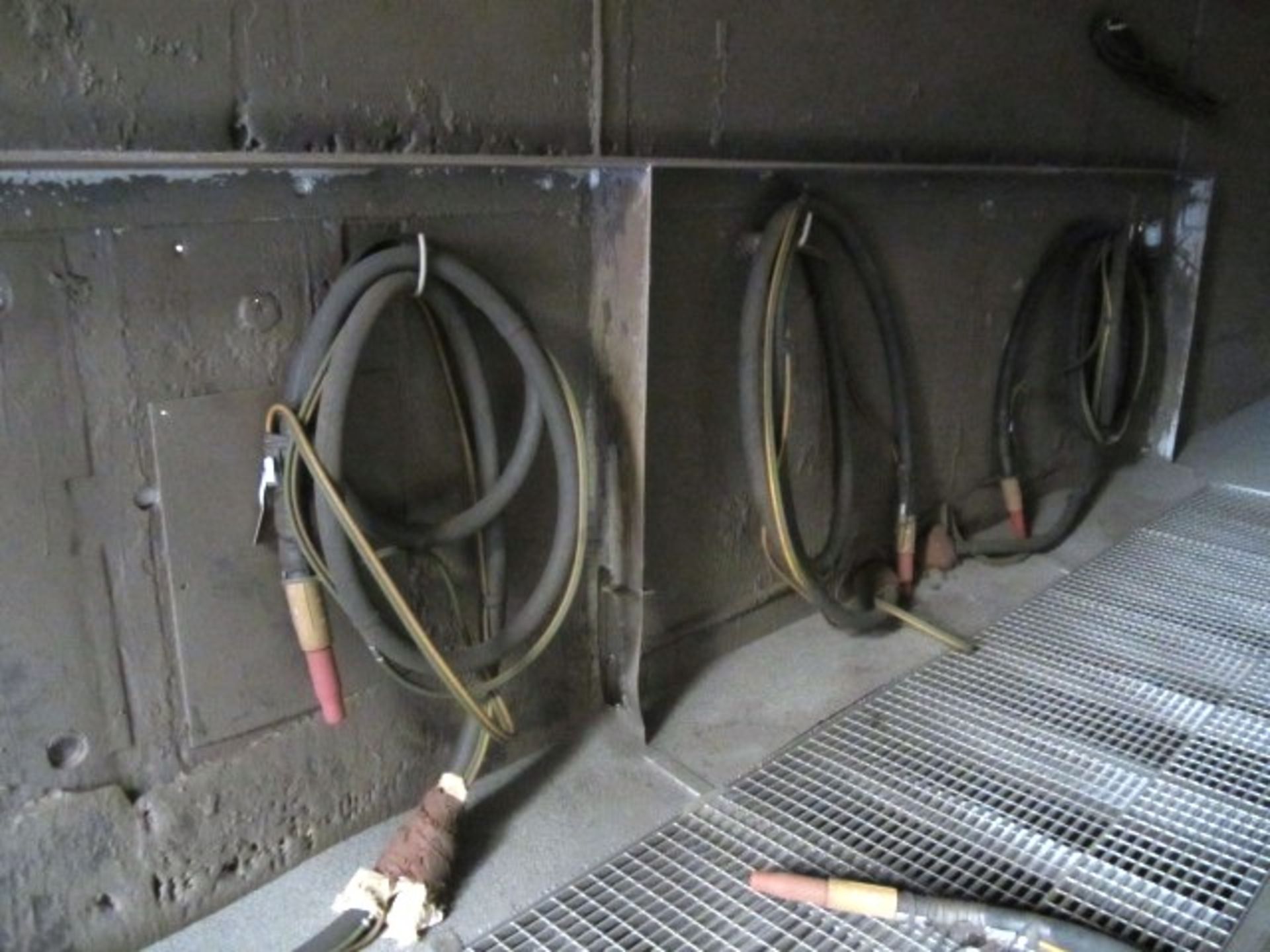 Four circa 6m length shot blast hoses