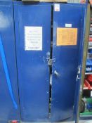 Blue twin door steel storage cabinet and assorted miscellaneous stock to include sandpaper, abrasive