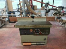 SCM T130 spindle moulder with comatic feed unit NB: this item has no CE marking. The Purchaser is