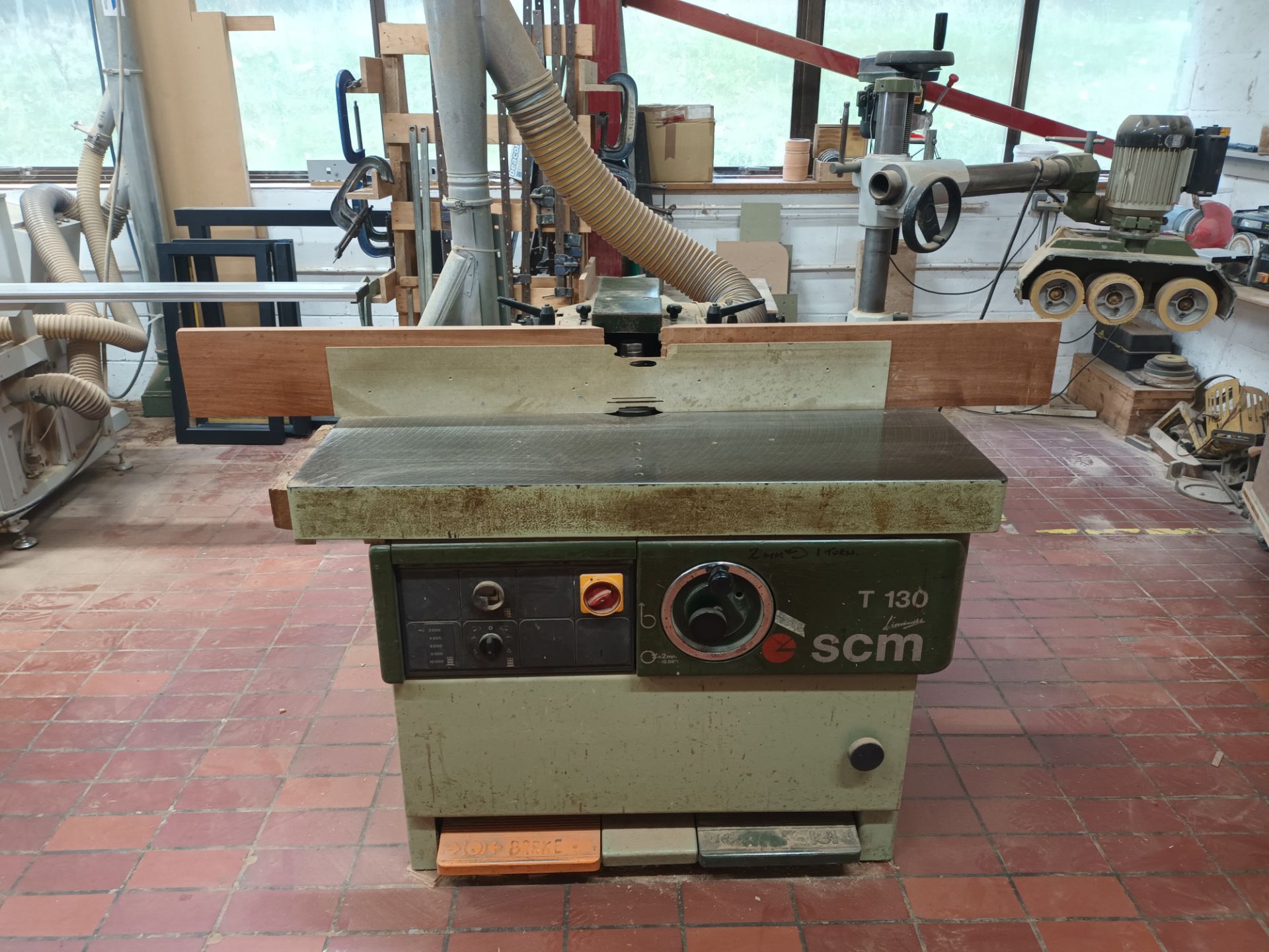 SCM T130 spindle moulder with comatic feed unit NB: this item has no CE marking. The Purchaser is
