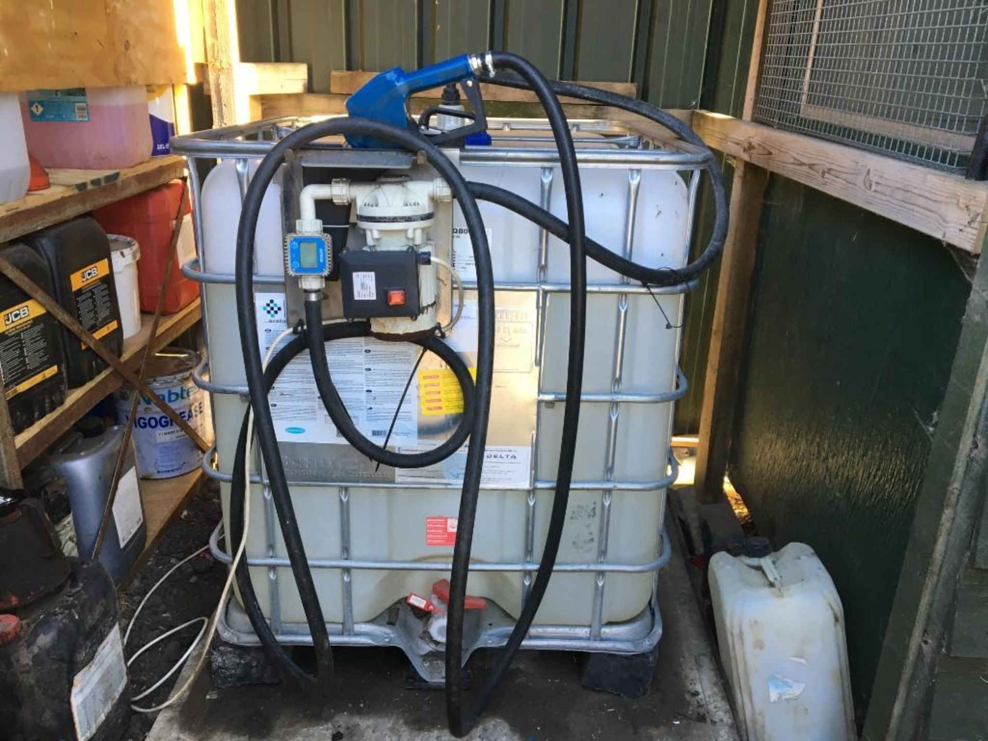 IBC c/w approximately 850 litres of AdBlue with electric pump dispensor