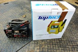 A Toptech 3-1 12v booster pack with light and 6/12v battery charger