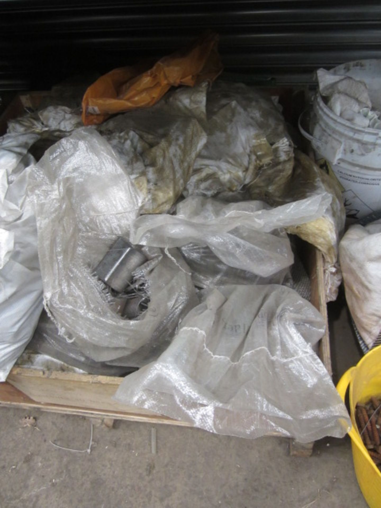 Contents of bay of racking including steel profiles, heavy duty bolts, metal clips etc., as lotted - - Image 16 of 19