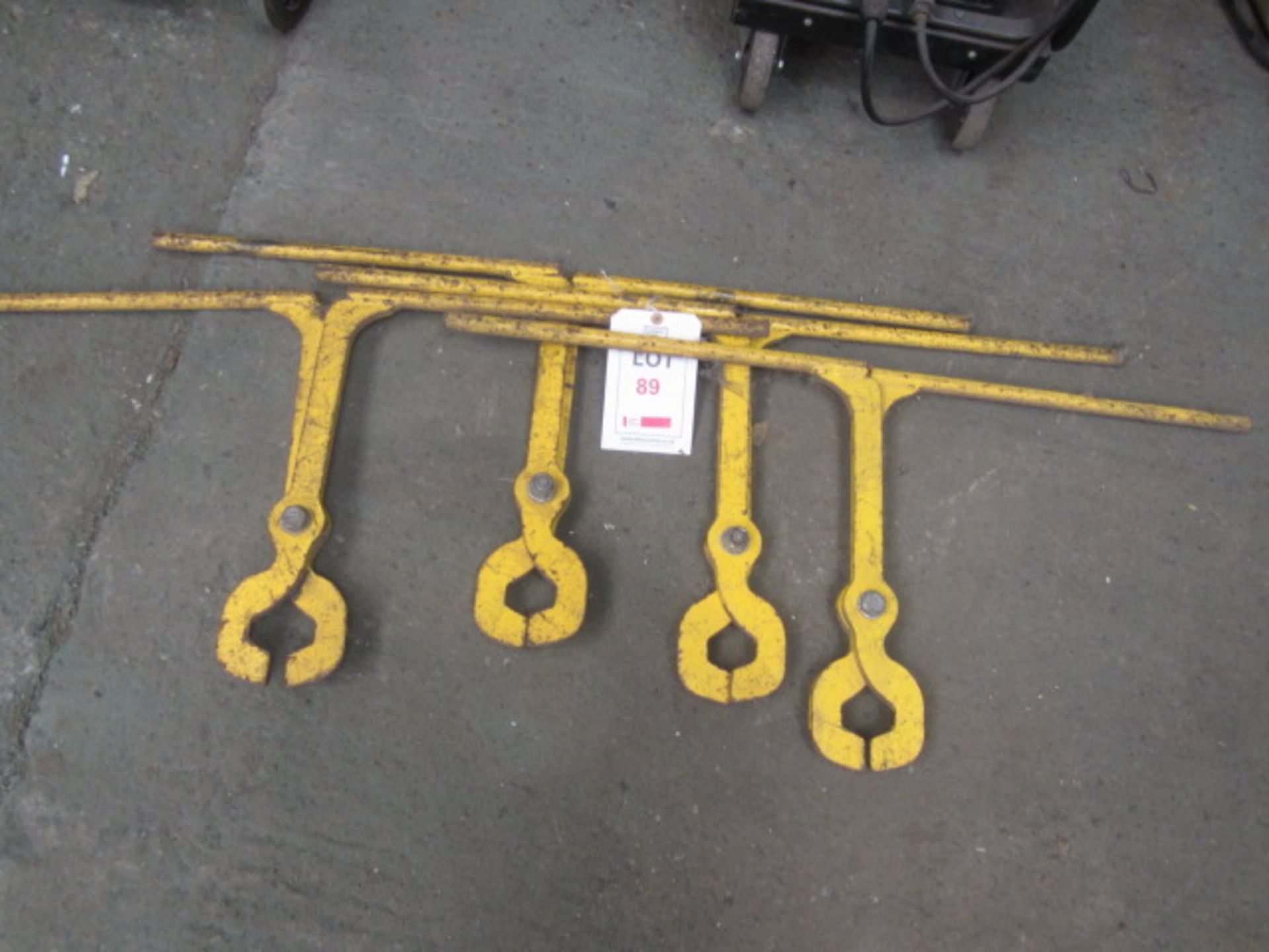 Four manual rail lifting clamps
