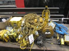 Assorted 110v site equipment including transformer, site lights, splitter boxes, reeled cable