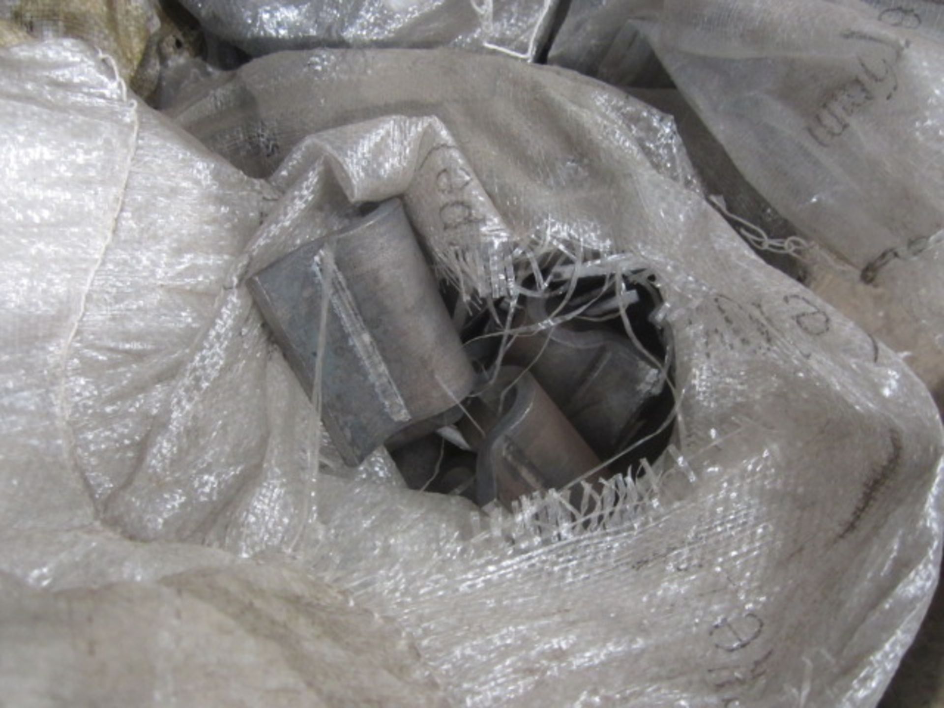 Contents of bay of racking including steel profiles, heavy duty bolts, metal clips etc., as lotted - - Image 15 of 19