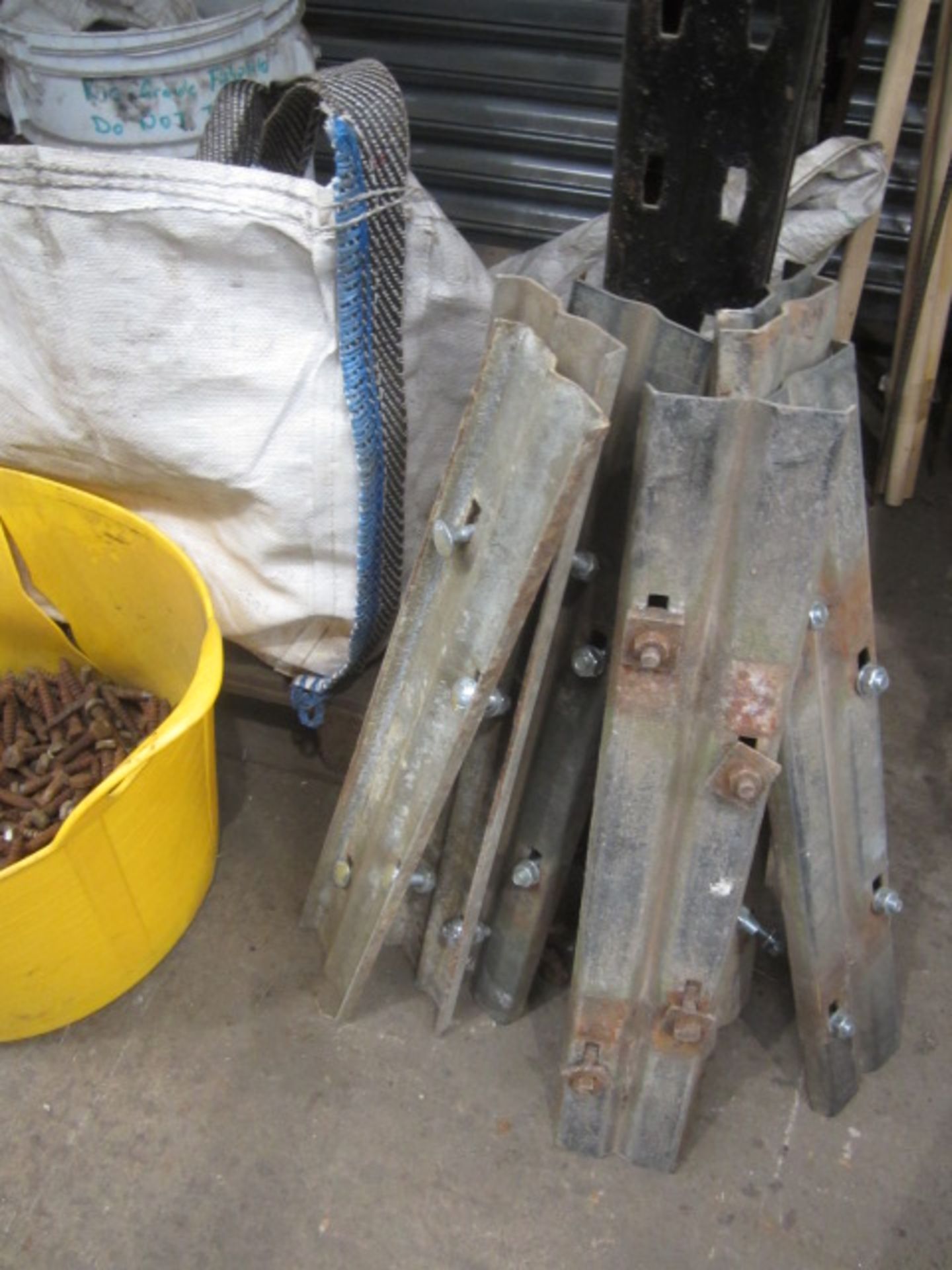 Contents of bay of racking including steel profiles, heavy duty bolts, metal clips etc., as lotted - - Image 18 of 19