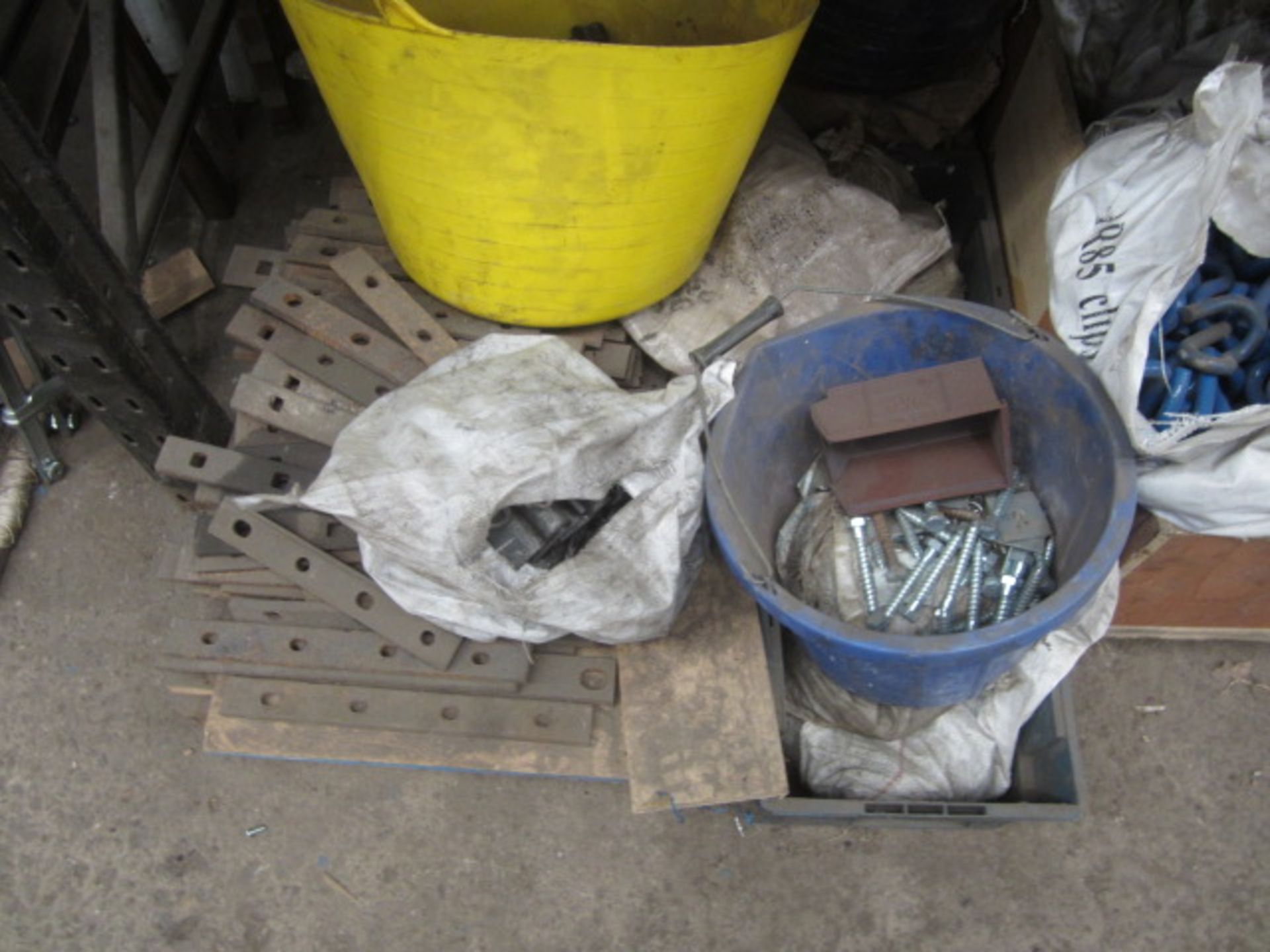 Contents of bay of racking including steel profiles, heavy duty bolts, metal clips etc., as lotted - - Image 4 of 19