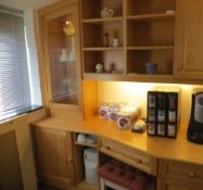 Bespoke solid wood maple with angled base drawers and cupboard with units to angled ceiling above in