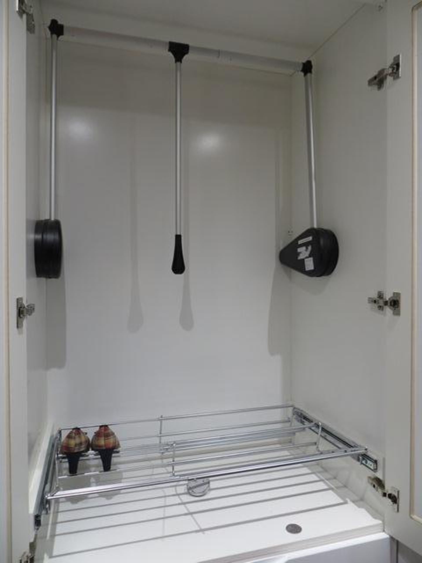 Bespoke white gloss wardrobe unit with 5 doors (2 mirrored) with Sprung loaded pull down wardrobe ra - Image 3 of 6