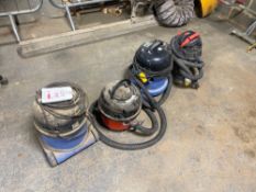 Four various vacuum cleaners