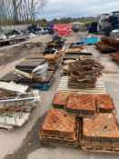 14 Pallets of various size cast-iron manhole covers and casings