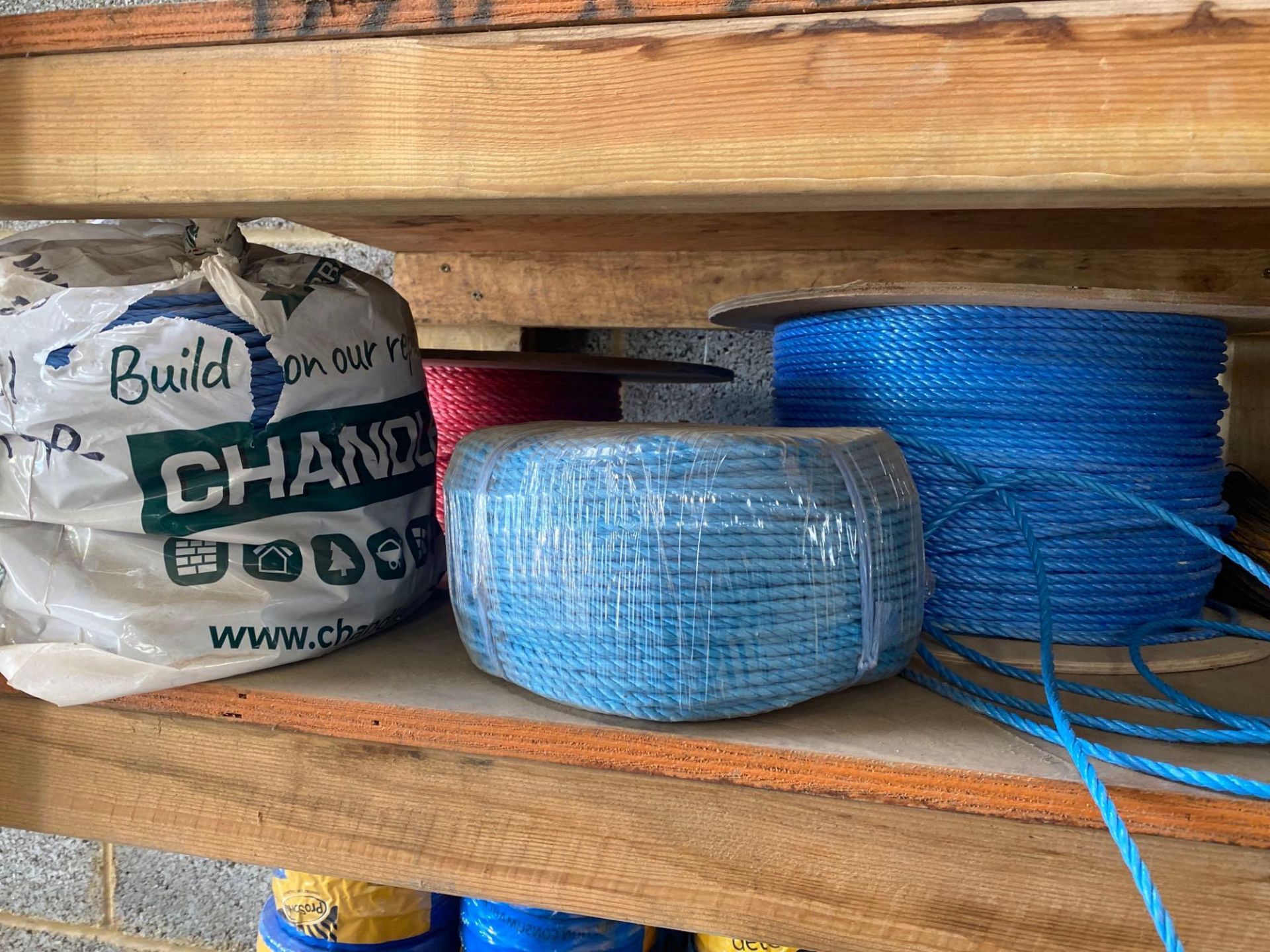 Four reels of draw rope and two reels of fence wire