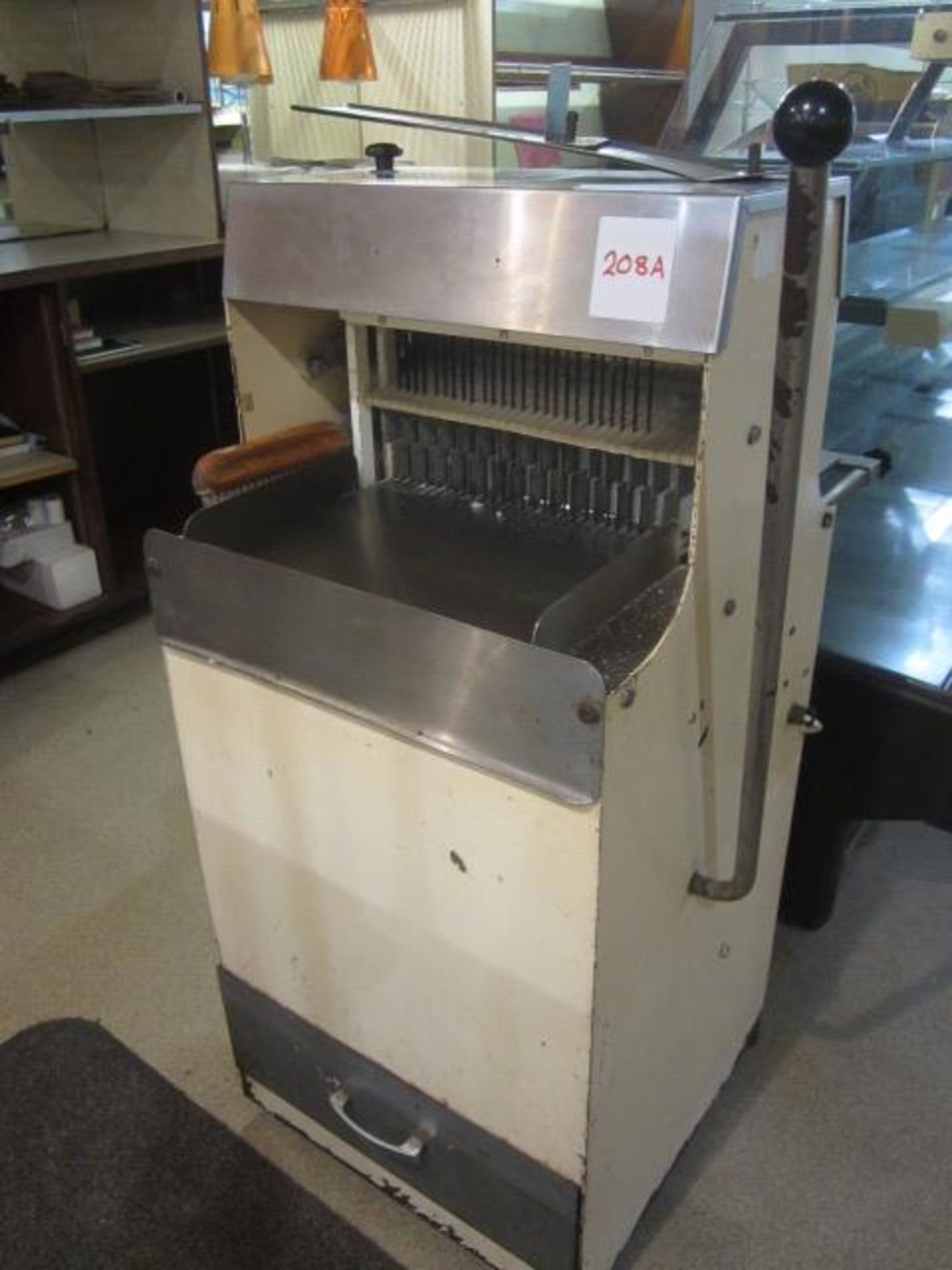 Free standing bread slicer, 700mm x 520mm x 1140mm **Located: Puddy Mark Café, High Street,